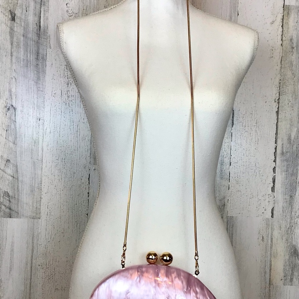 #67
Aqua Pink Clutch with Gold Chain

Acrylic Clutch - Exclusive
